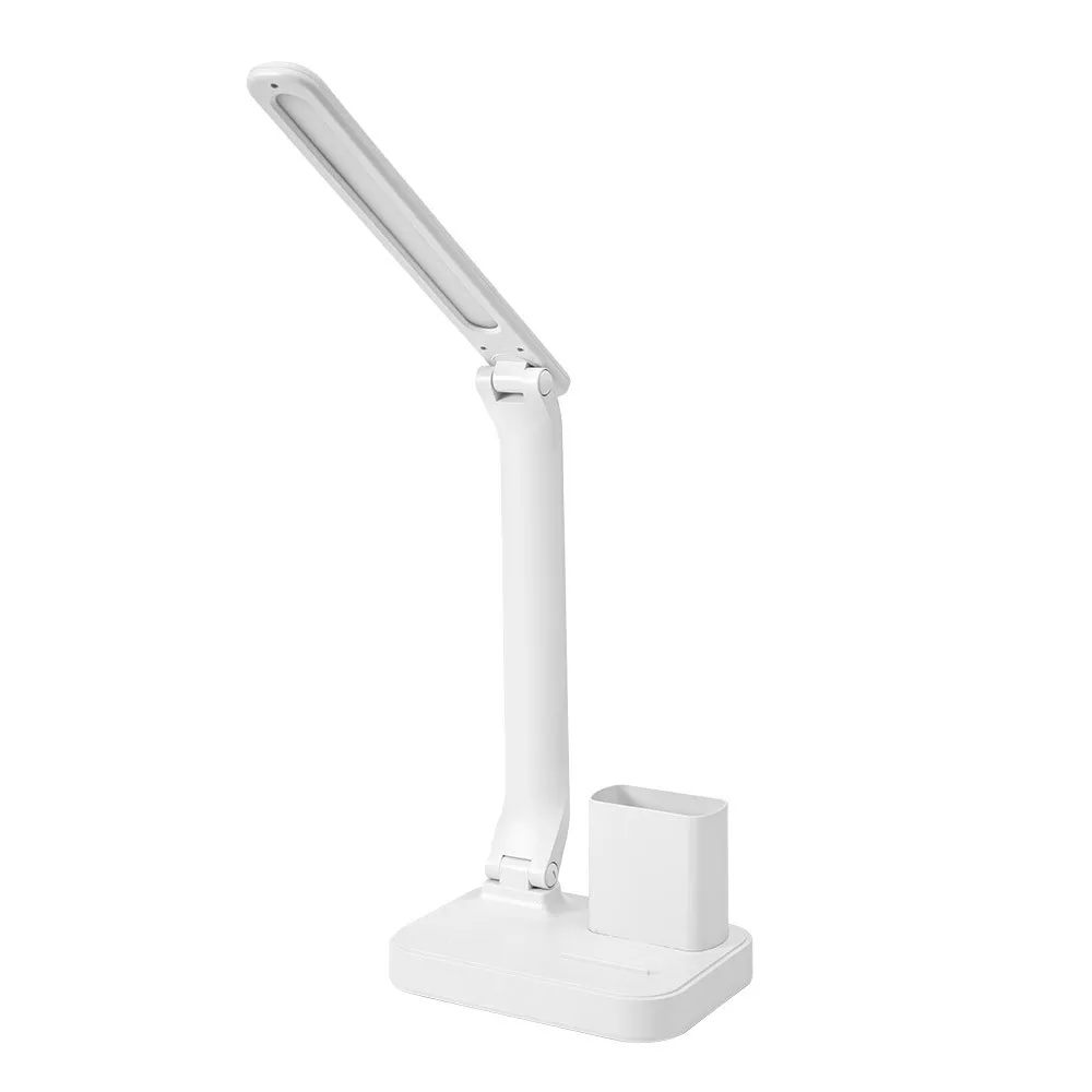Flexo led blanco regulable base portalápiz Bosco Fabricado en ABS con portalápiz en su base y una bandeja para depositar clips, goma, etc. También posee de un filo donde reposar su dispositivo móvil en posición idónea para su visualización tanto arriba como en la bandeja. Su iluminación es de led integrado con una potencia de 6 watios, 450 lúmenes y tres tonos de luz 3000ºK(cálida), 4500ºK(neutra) y 6000ºK(fría) regulable en intensidad de luz e interruptor táctil